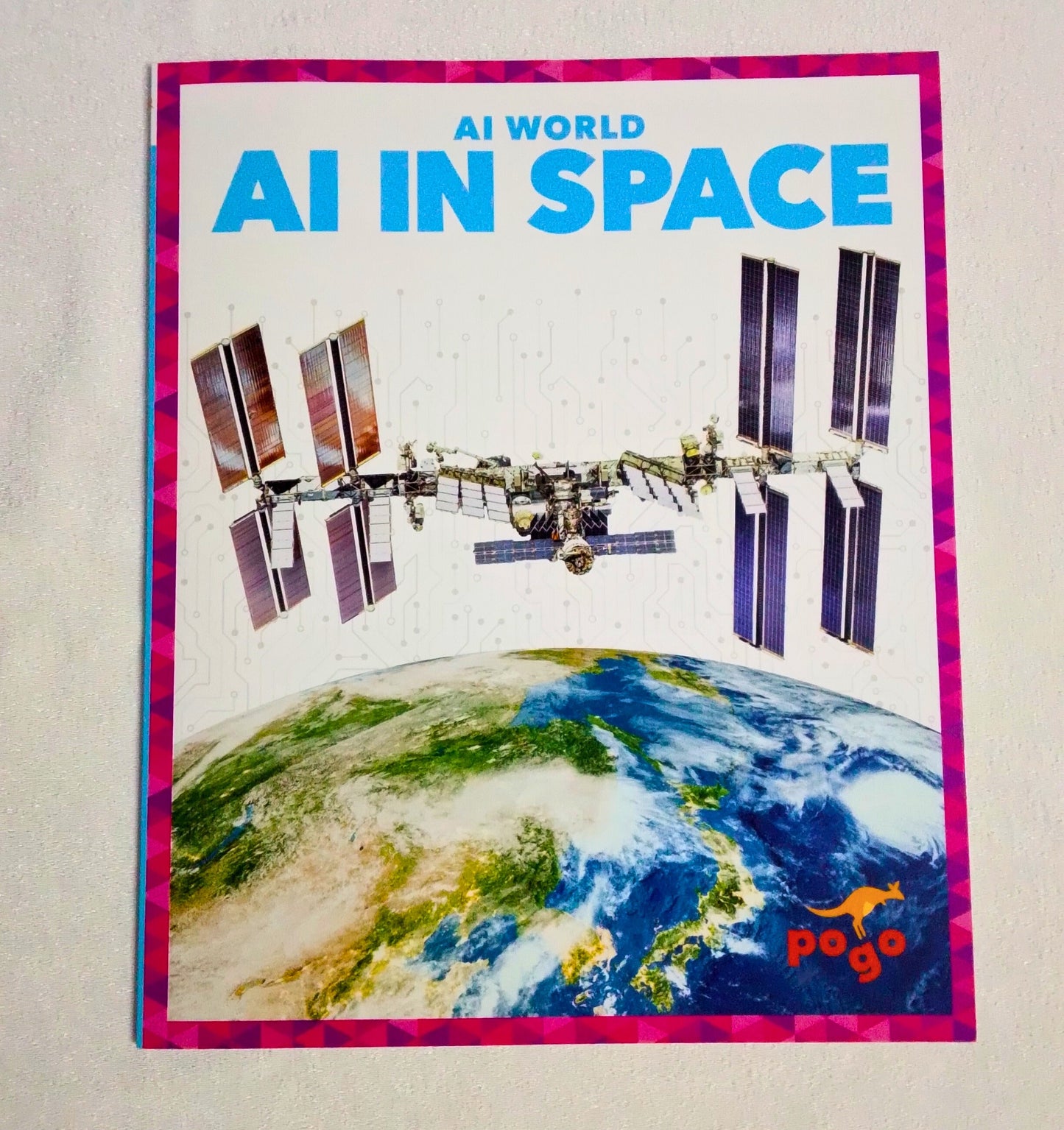 Book cover titled 'AI in Space' with a space station and Earth image on a light gray background.