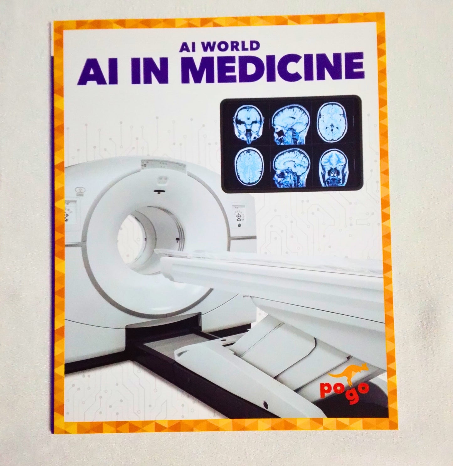 Book cover titled 'AI in Medicine' with medical imaging on a white background