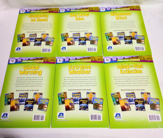 Set of educational books on a white surface