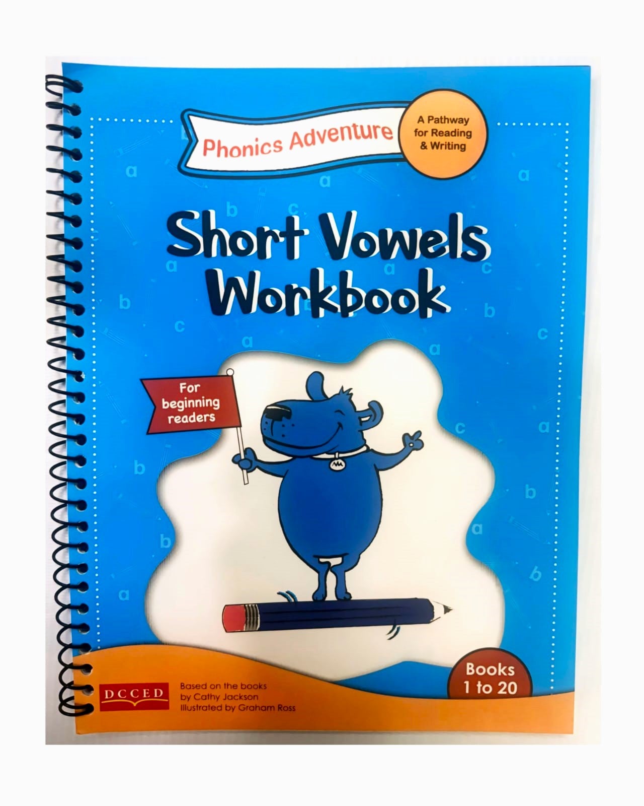 Short Vowels Workbook for beginning readers with a blue cover and cartoon character holding a pencil.