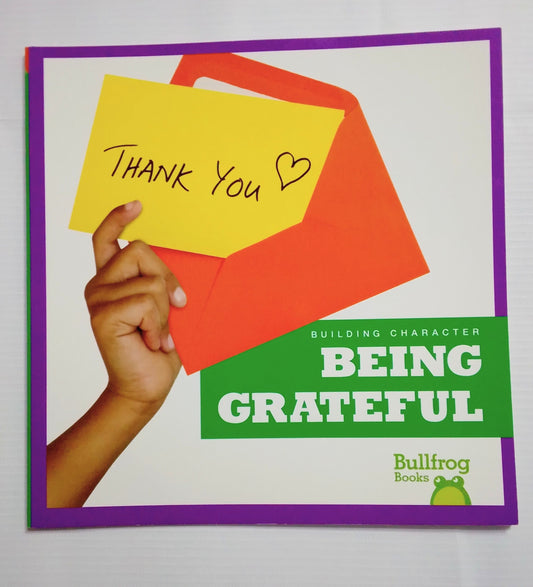 Book cover of 'Being Grateful' by Bullfrog Books with a hand holding a 'Thank You' card.