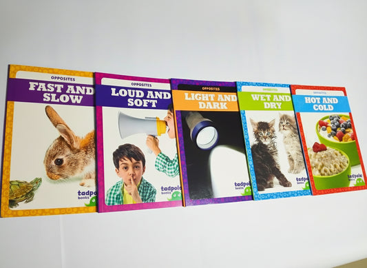 Collection of opposites books on a white surface