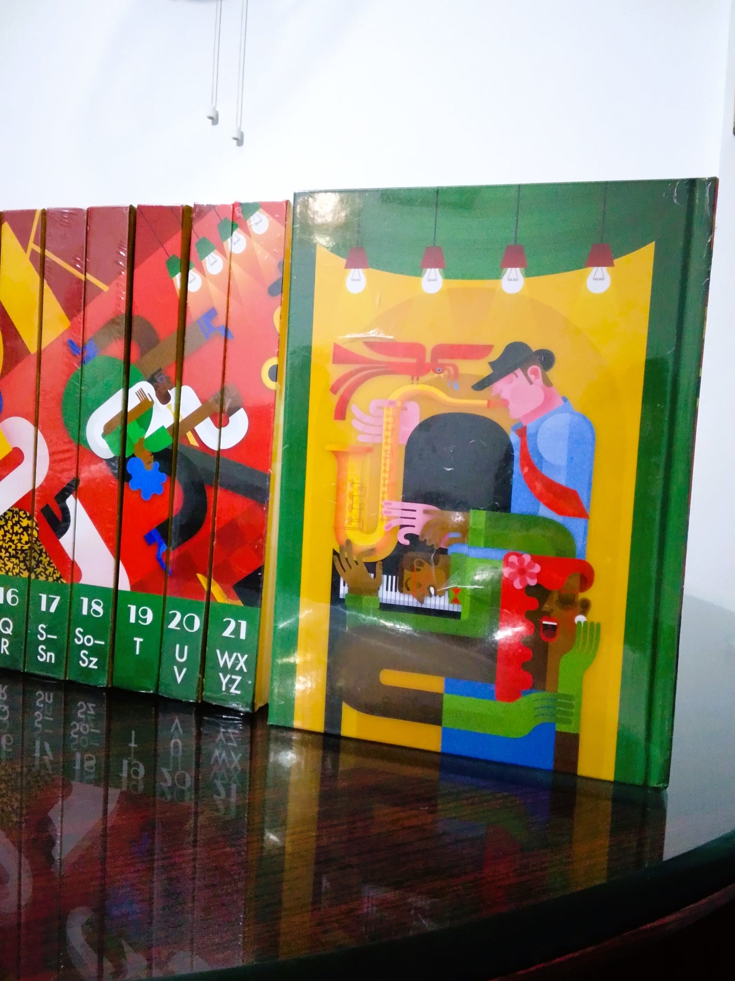 World Book's back cover with a character playing an instrument on a wooden surface.