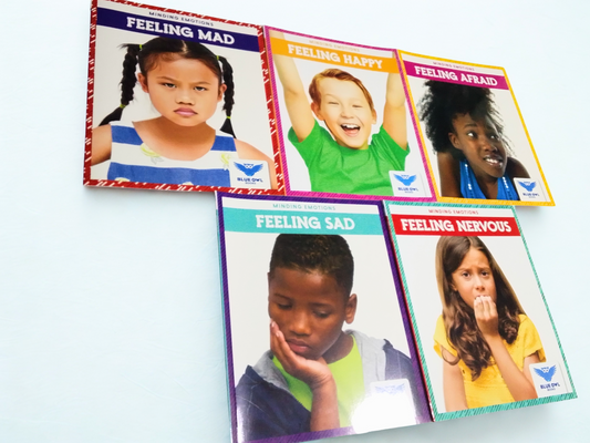 Set of books with children's faces on a white background