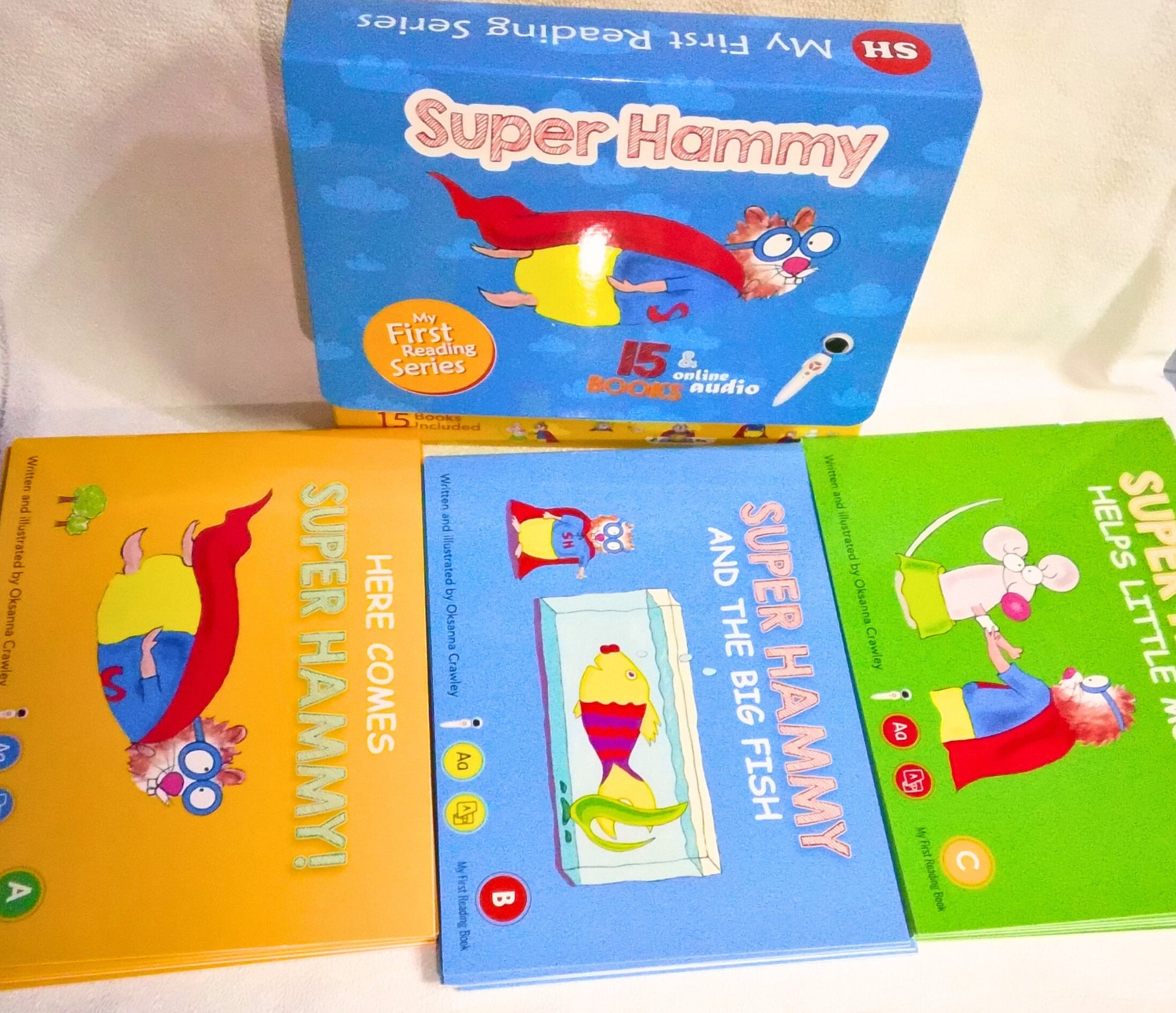 Set of children's books titled 'Super Hammy' on a white surface.