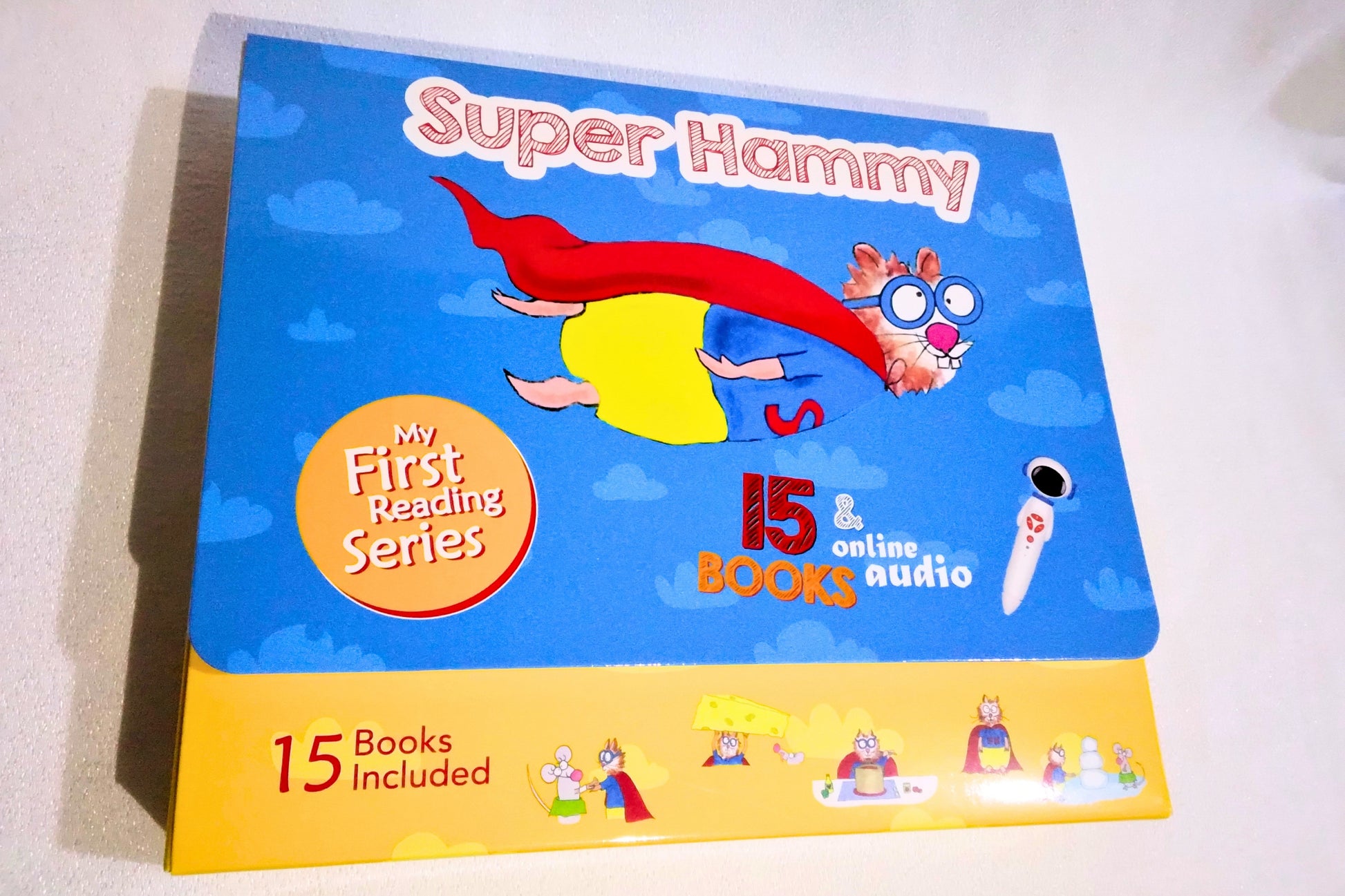 Super Hammy book series packaging with cartoon character on a blue and yellow background